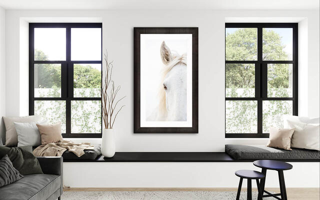 Modern white horse horse artwork framed in elegant Roma moulding. Beautifully framed minimal photograph of a Camargue horse against a white sky.