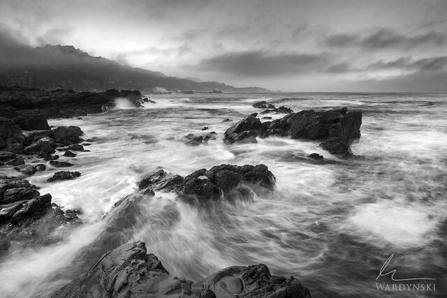 Waves swirl around rocks in Big Sur California