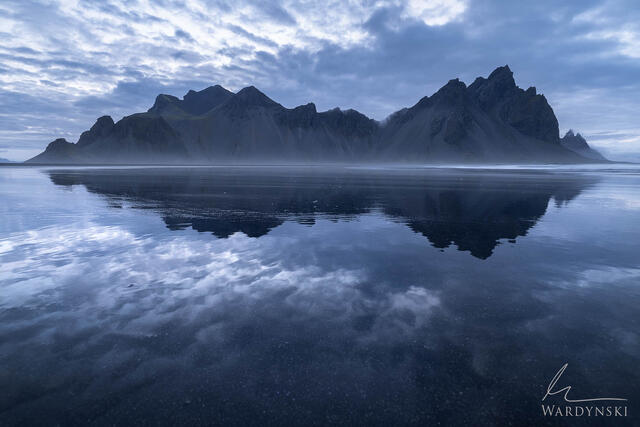 Limited edition photograph of Vestrahorn on Icelands eastern coast. Wet sand acts like a mirror and perfectly reflects the evening sky